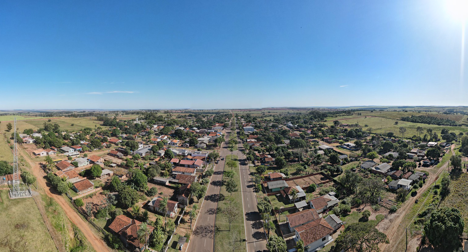 imagem aérea do distrito, mostrando ruas e casas
